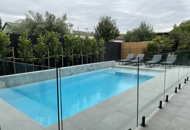 Noosaville Project, Blackbutt timber vertical screen in the background for pool equipment shed